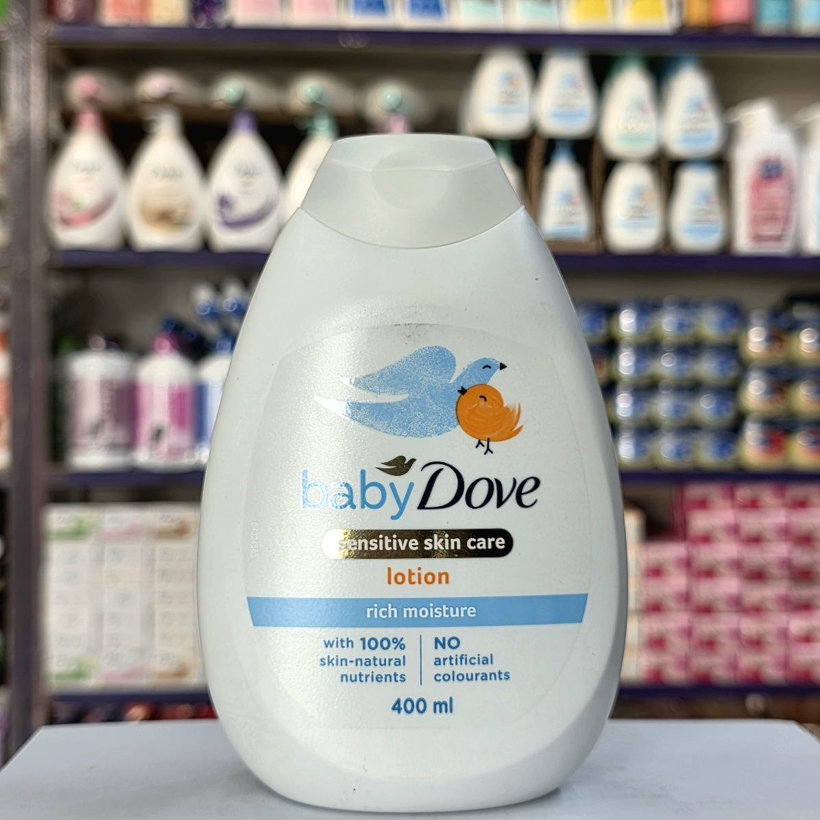 لوسیون بدن Baby Dove مدل Sensitive Skin Care حجم ۴۰۰ میل – برای پوست حساس نوزادان